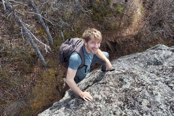 Tristan Cleveland, Hubbards Streetscape committee member, rock climbing.